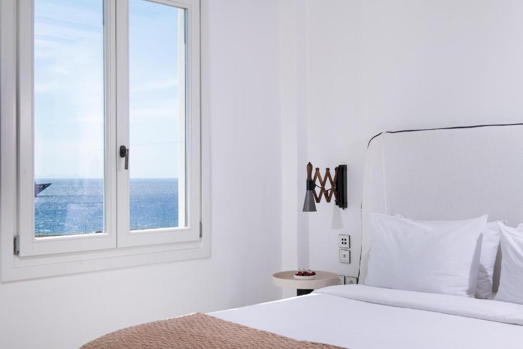 Porto Mykonos Hotel - Tap to explore photos