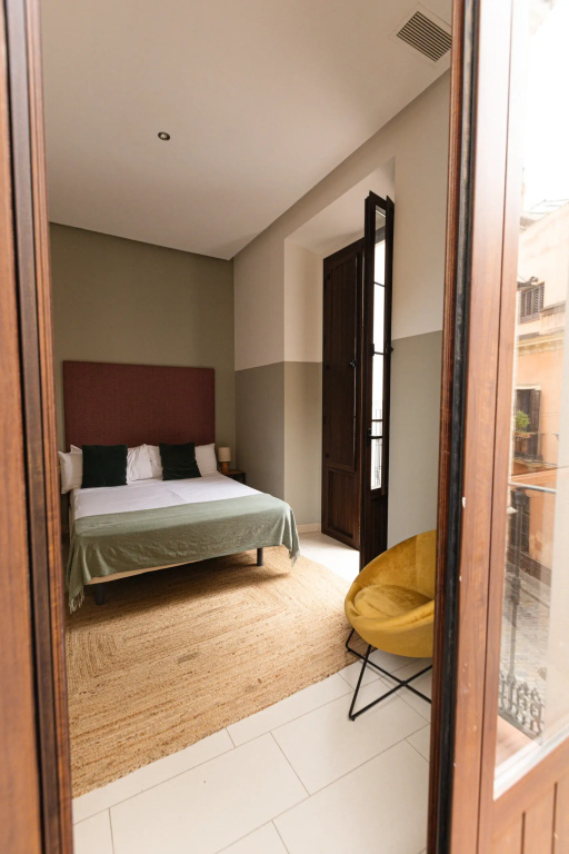 Guzman El Bueno Suites - Chambres