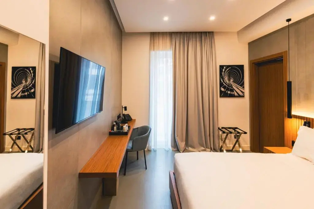 J Maluni City Hotel - Chambres