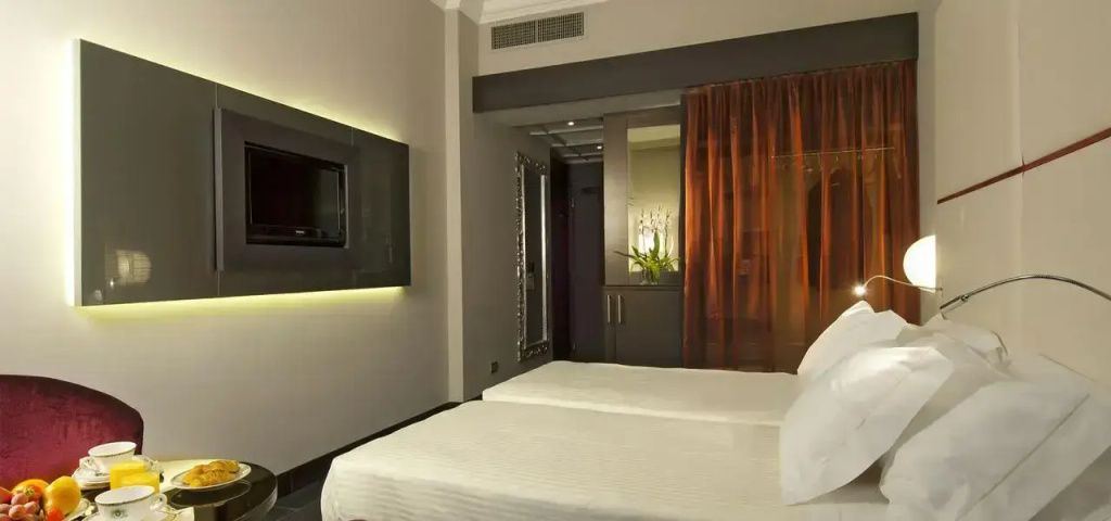 Sina De la Ville Hotel - Chambres