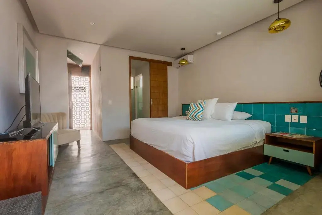 Deluxe Double room with balcony and with pool view full double bed