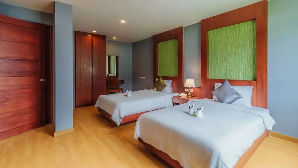 Elite Suites Patong Hotel - Chambres