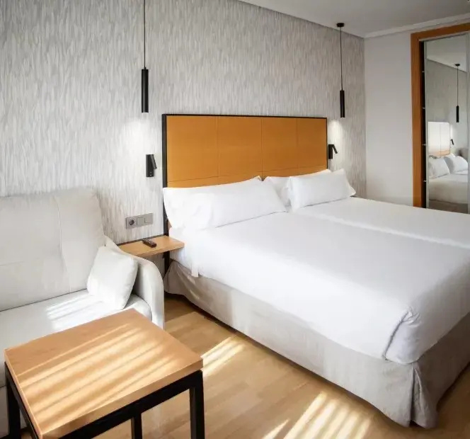 Hotel Sercotel Gran Fama - Chambres