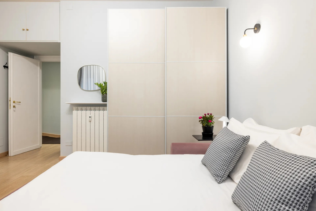 Room with sofa bed and comfortable regular mattress