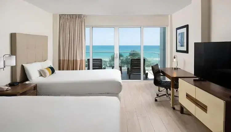 Deluxe Quadruple room with balcony and Oceanfront