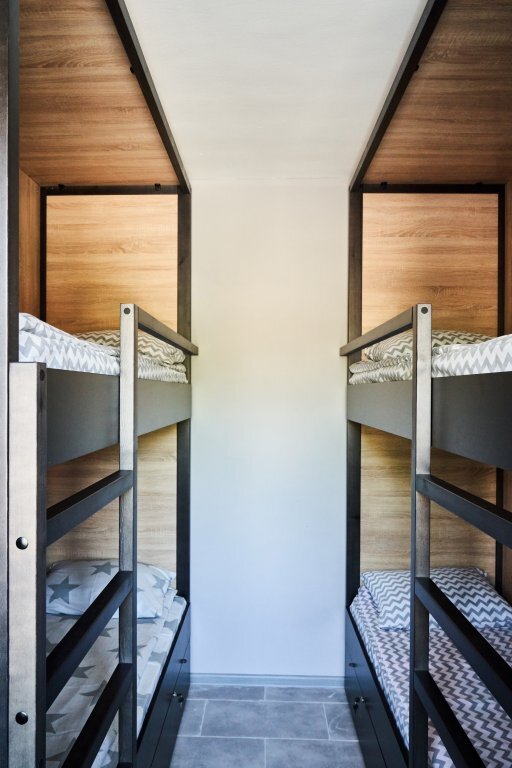 Кровать в общем номере в Baikal Capsule