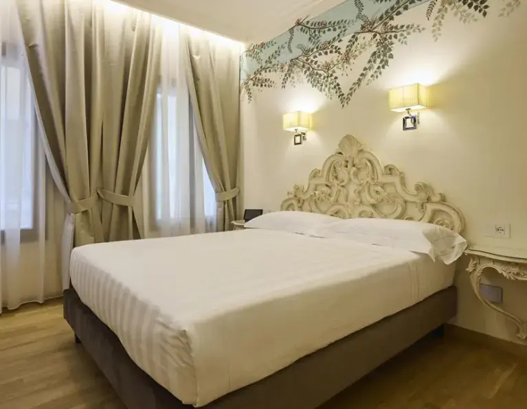 Deluxe in Dependance Family Triple room