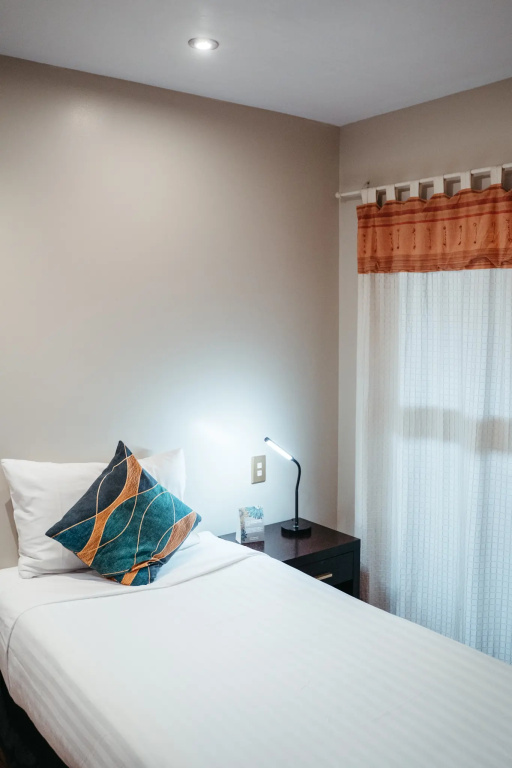 Auckland City Hotel - Chambres