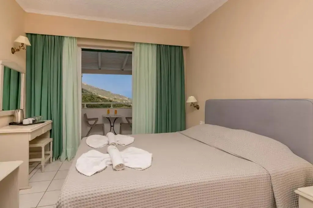 Family Quadruple room with garden view