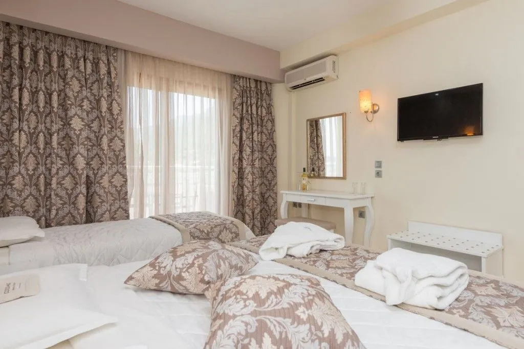 Superior Triple Junior Suite with Side Sea View