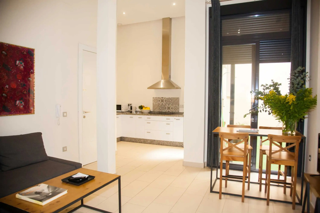 Guzman El Bueno Suites - Chambres