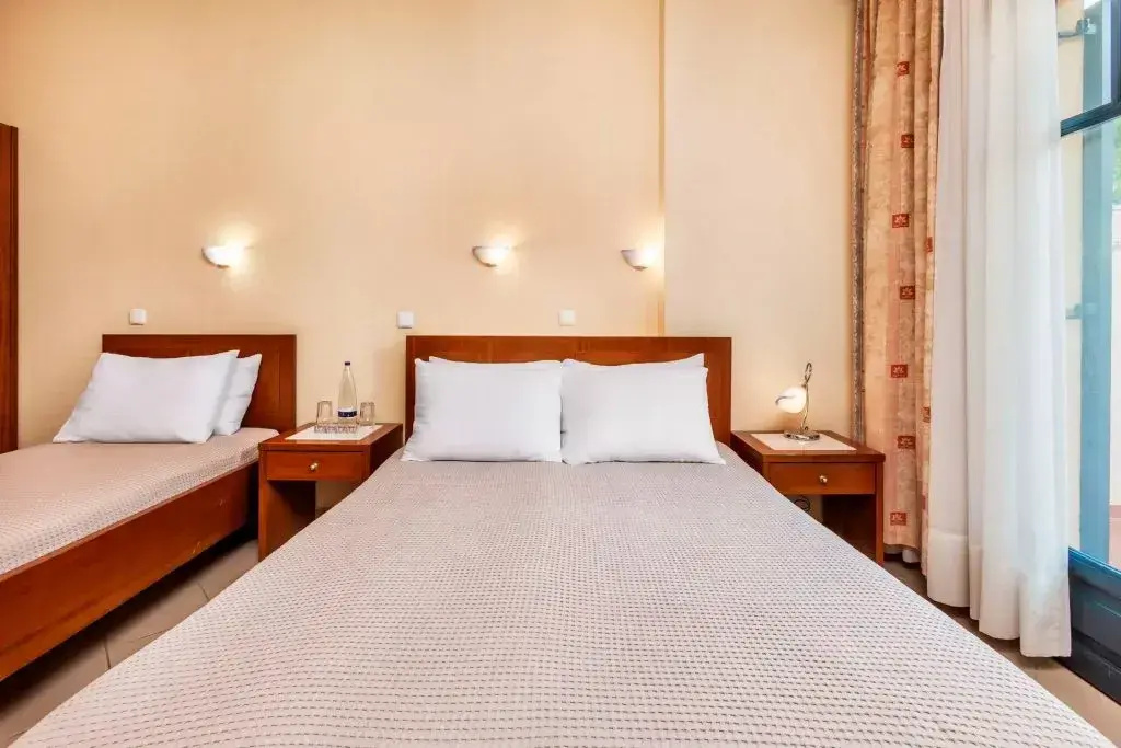 Atrium Hotel - Chambres