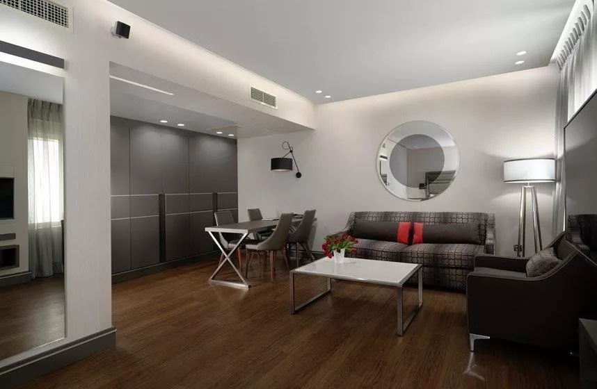 Holiday Suites - Chambres