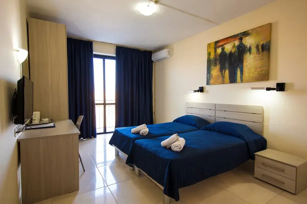 Relax Inn Hotel - Chambres