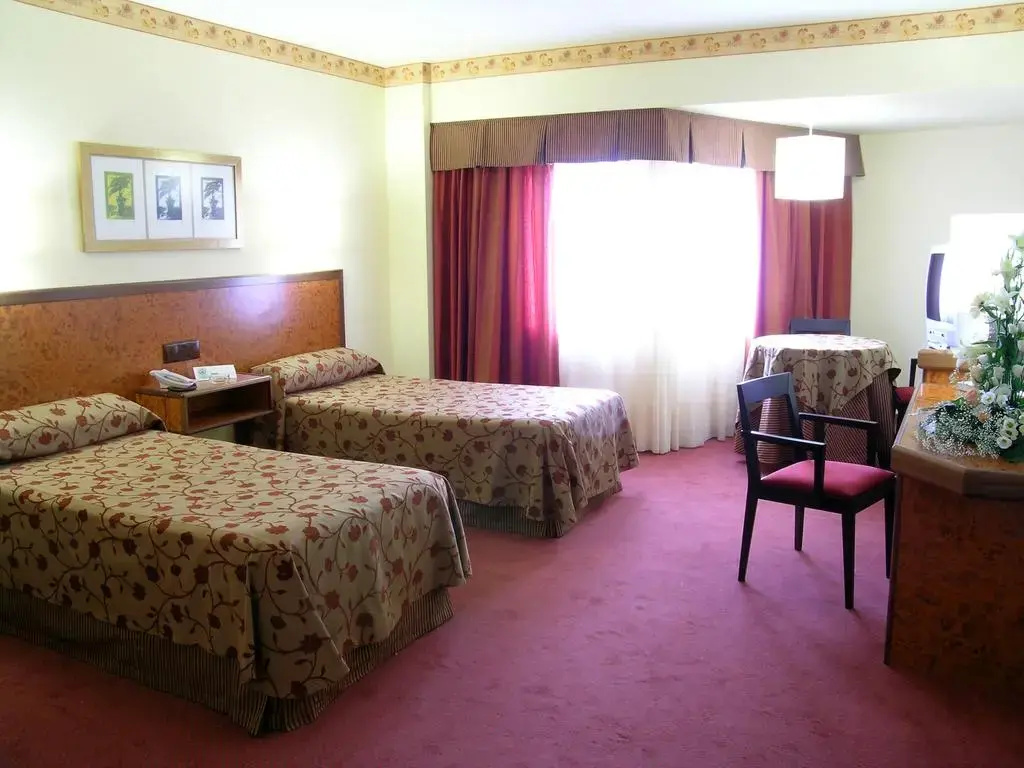 Hotel Sercotel Cuatro Postes - Chambres