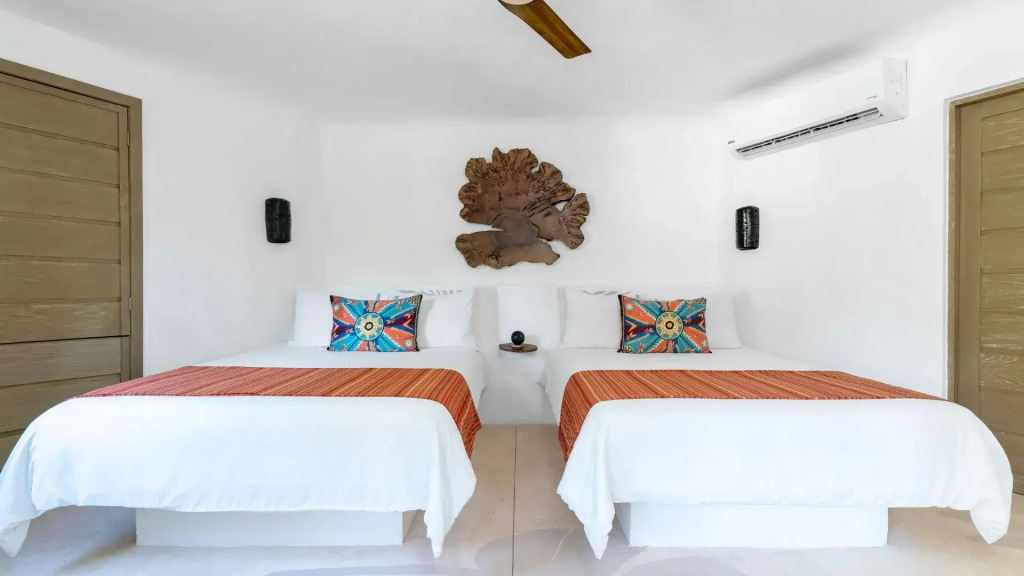 Двухместный номер с видом на сад 2 отдельные кровати в Shangri-la Caribe Beach Village Resort