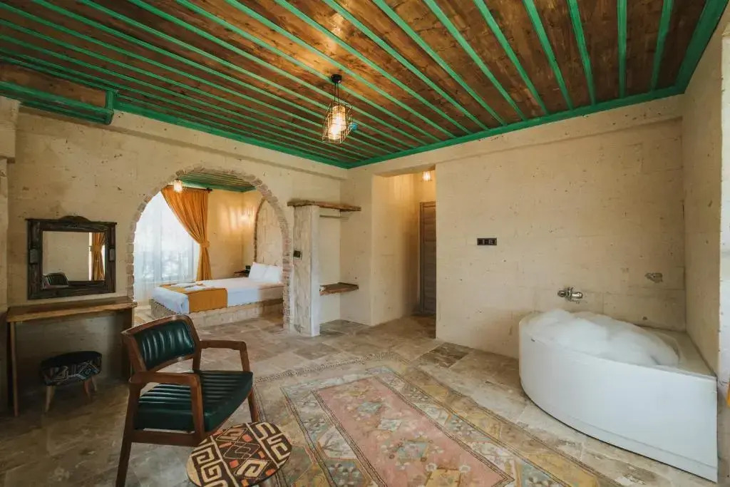 Двухместный люкс двуспальная кровать в La Casa Cave