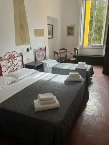 Standard Triple room with garden view
