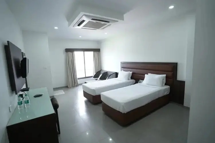 Metropolis Hotel - Chambres