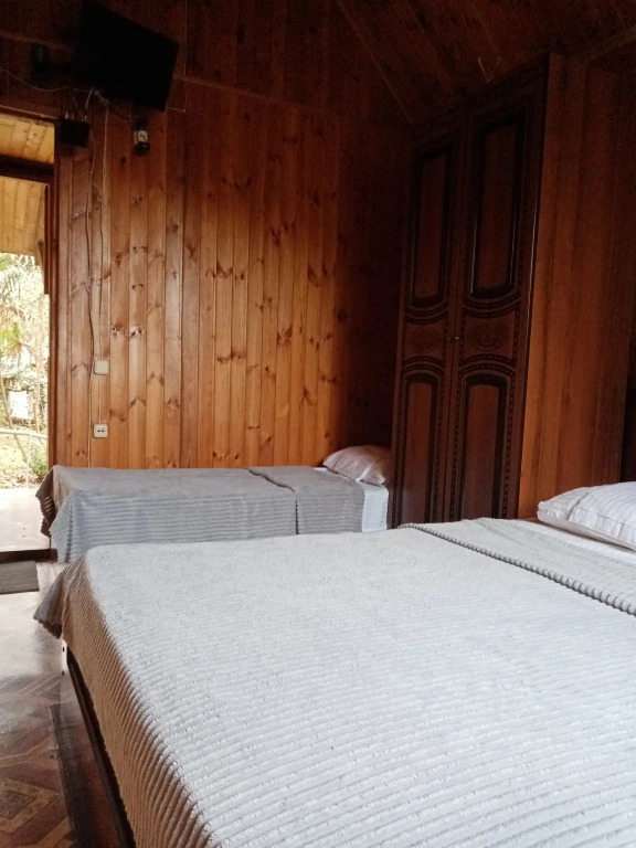 Трёхместный домик с балконом в Гостевой дом