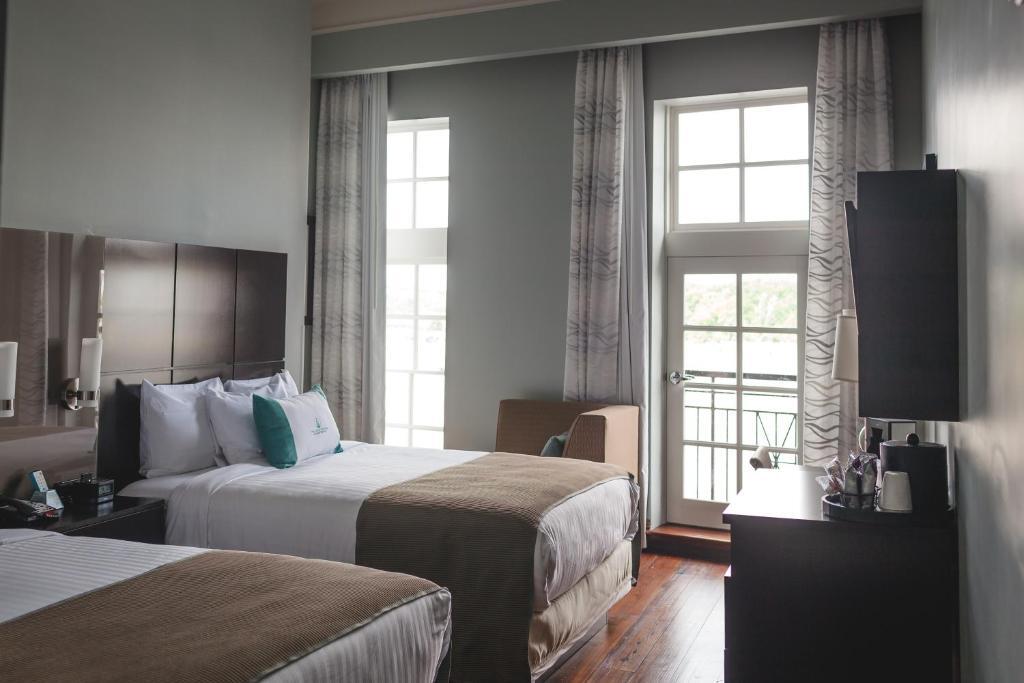 Четырёхместный номер в The Cotton Sail Hotel, Tapestry Collection By Hilton