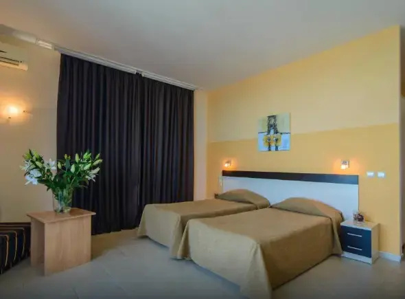Sunrise Hotel - Chambres