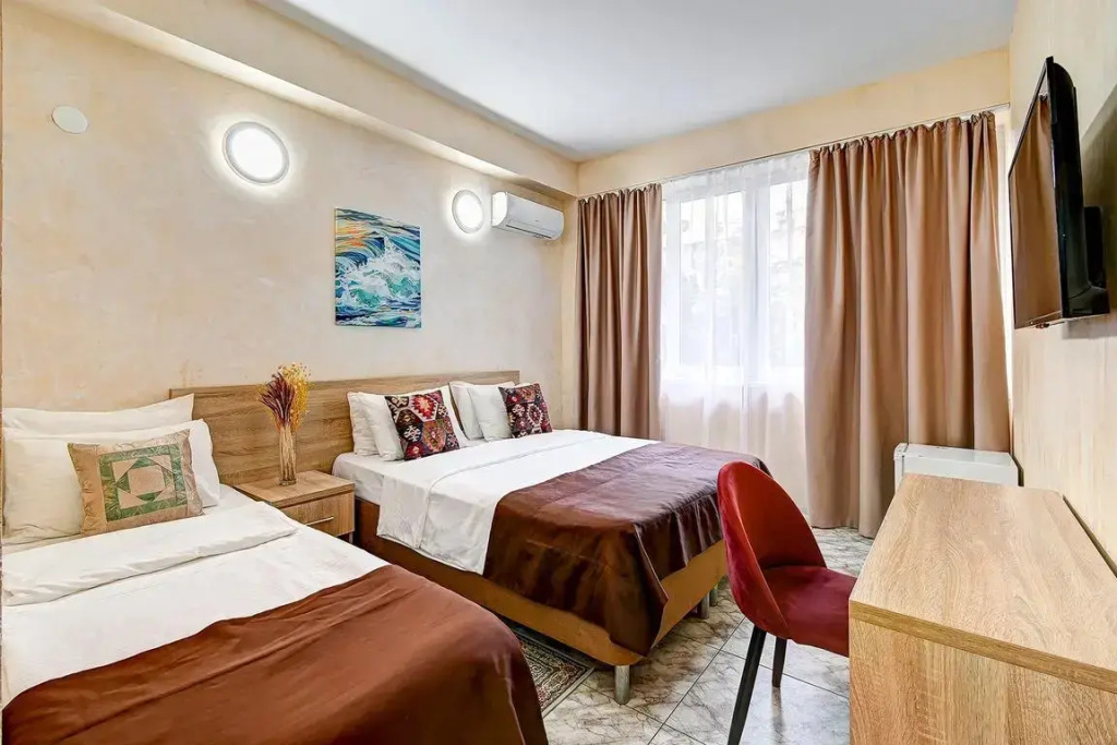 Comfort Triple room with balcony and with courtyard view