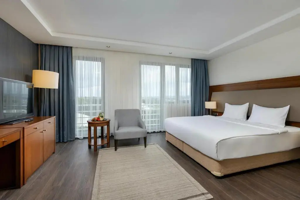 Superior Double room, full double bed and sofa room photo 1