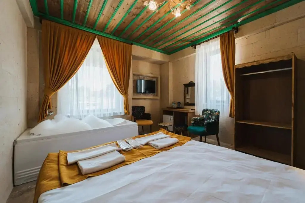 Двухместный люкс двуспальная кровать в La Casa Cave