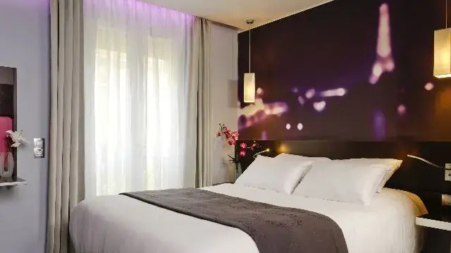 Двухместный номер двуспальная кровать в Hotel Lumières Montmartre Paris