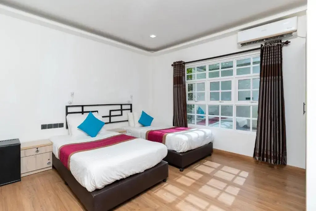 Double room with garden view (twin beds)