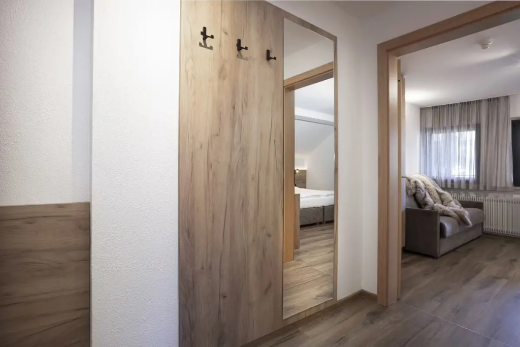 Aparthotel Familiaris - Family Apartments - Pools & Spa in the Dolomites - Chambres
