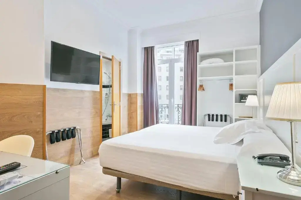 Superior Double room with side street view (full double bed)