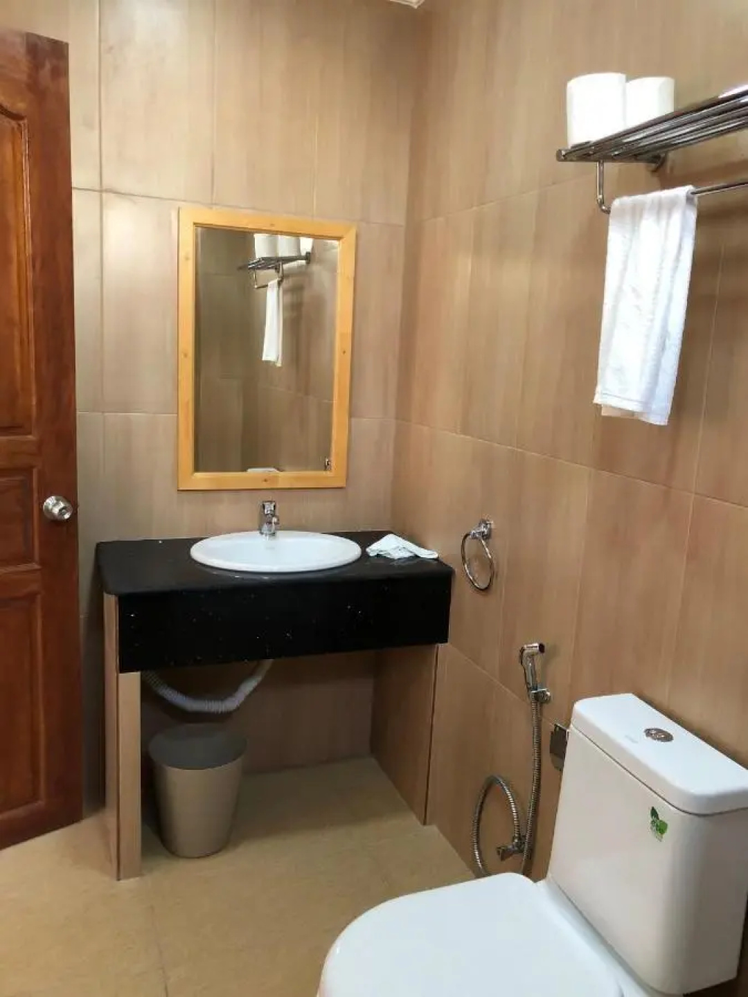 Iris Beach Residence — a bathroom