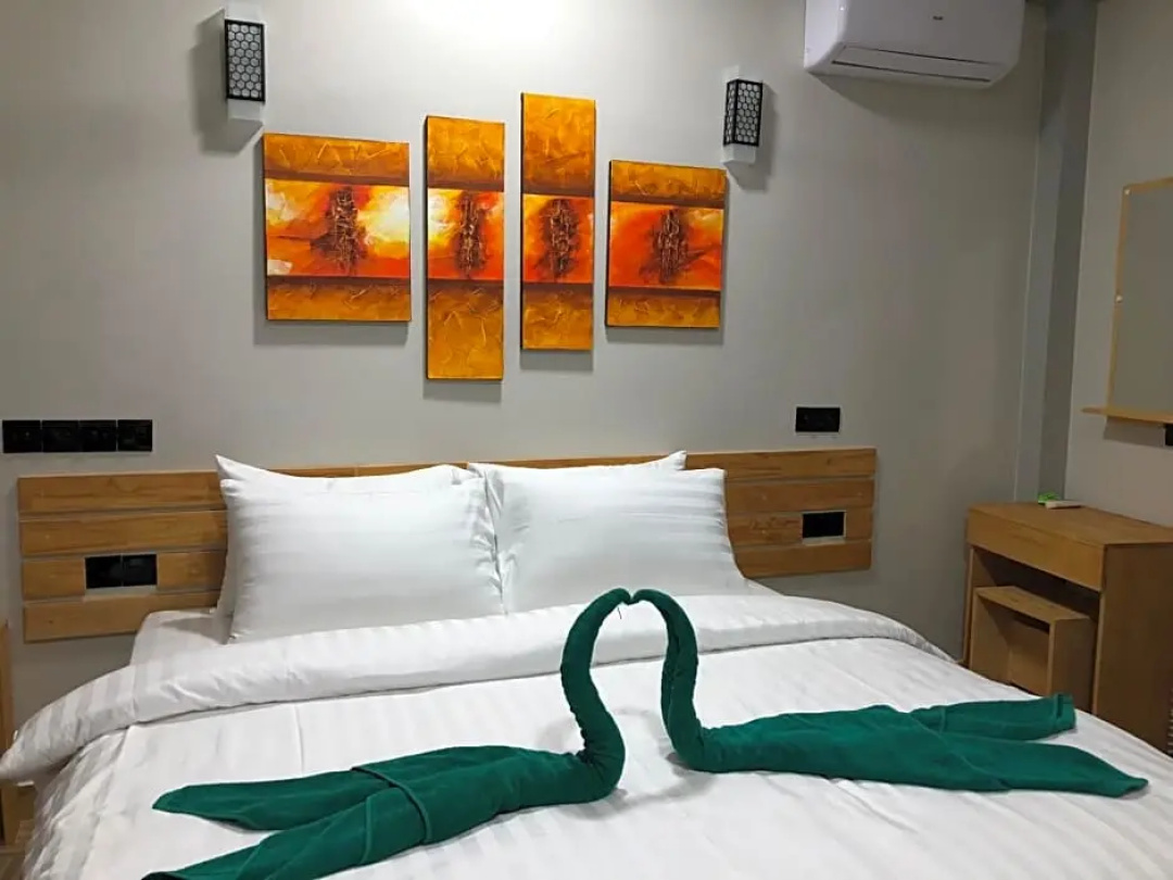 Iris Beach Residence — a room