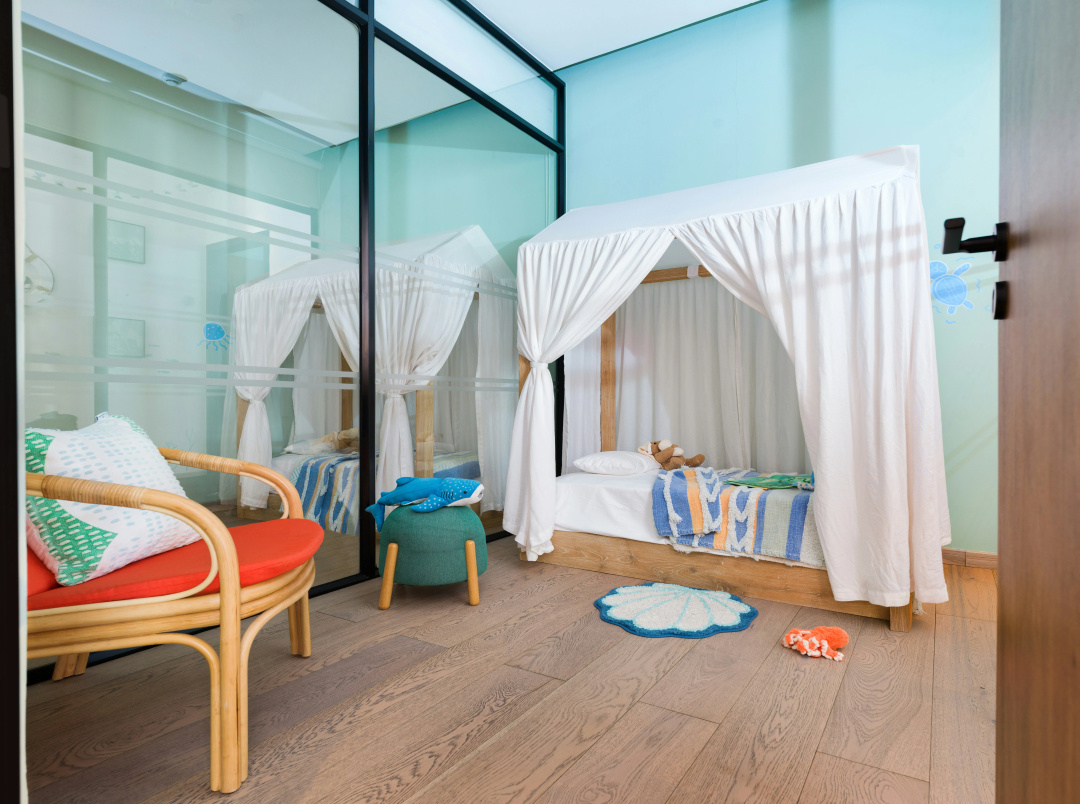 Hilton Maldives Amingiri Resort & Spa — a room