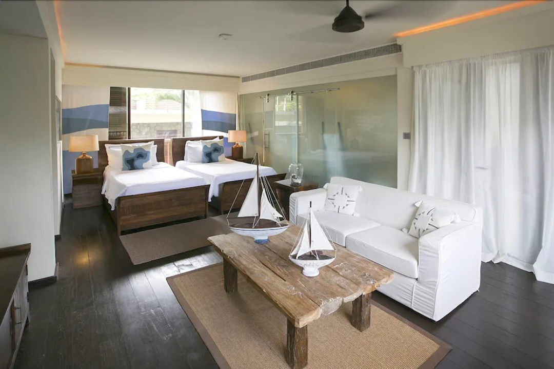 Dhevatara Beach Hotel — a room