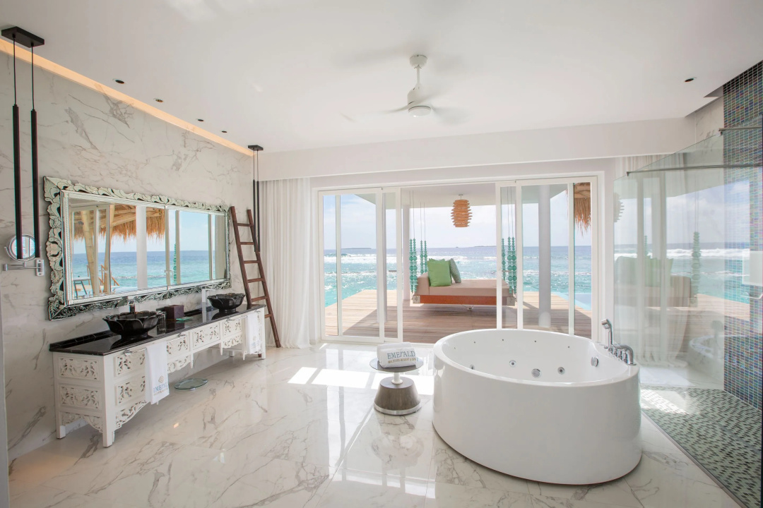 Emerald Maldives Resort & Spa — a balcony