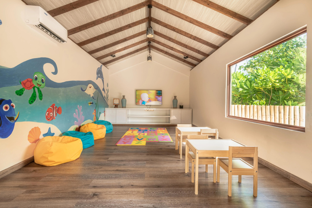 Fushifaru Maldives Resort — a room