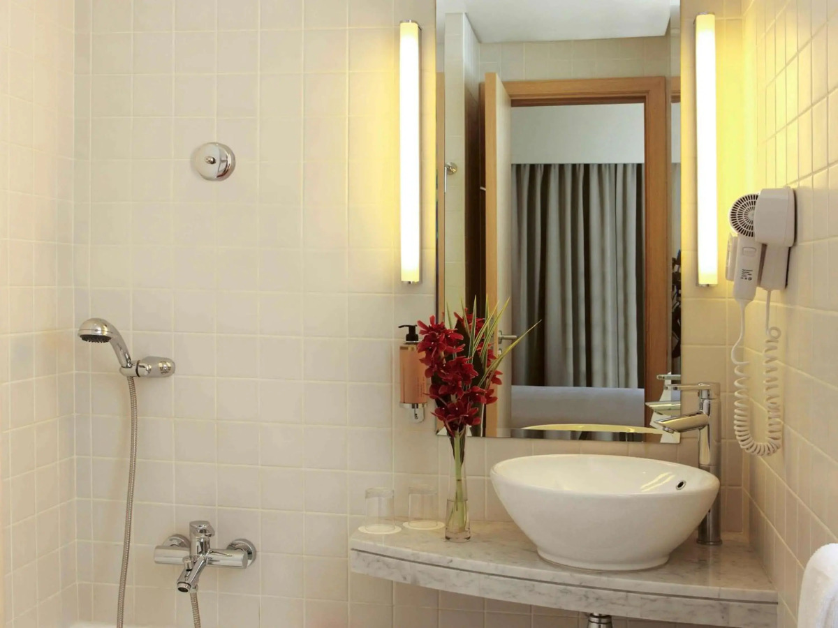 Отель Novotel Suites Mall Avenue Dubai