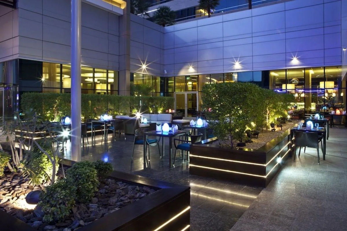 Отель Novotel Suites Mall Avenue Dubai