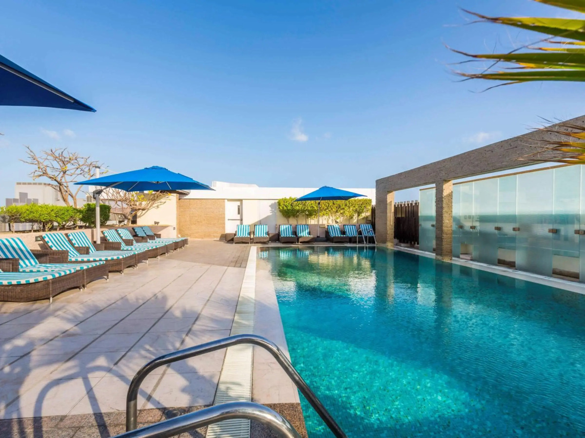 Отель Novotel Suites Mall Avenue Dubai