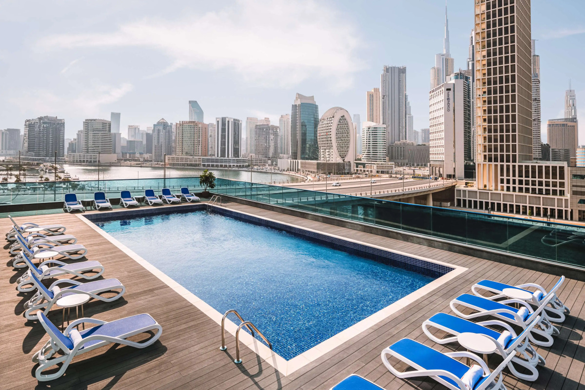 Отель Radisson Blu Hotel, Dubai Canal View