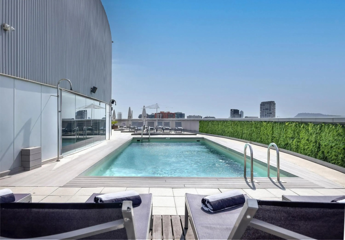 Отель Barcelona Condal Mar Affiliated by Meliá