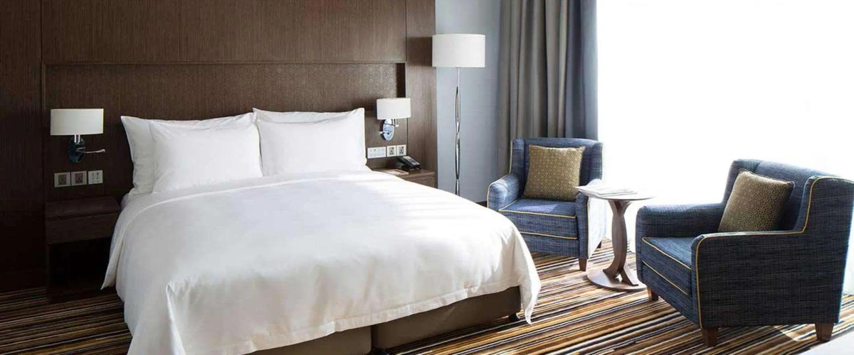 Отель Naumi Dubai