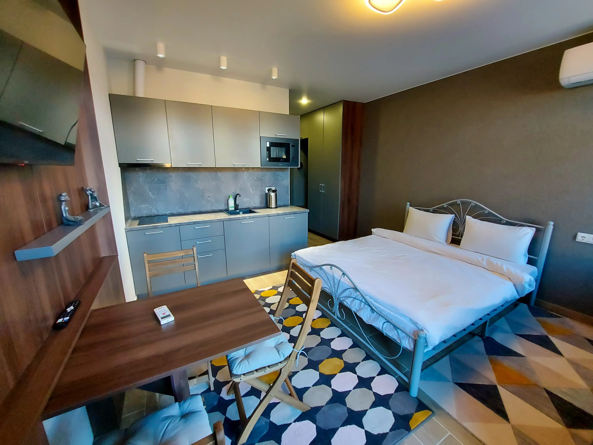 Апартаменты Уютная студия у Олимпийского парка