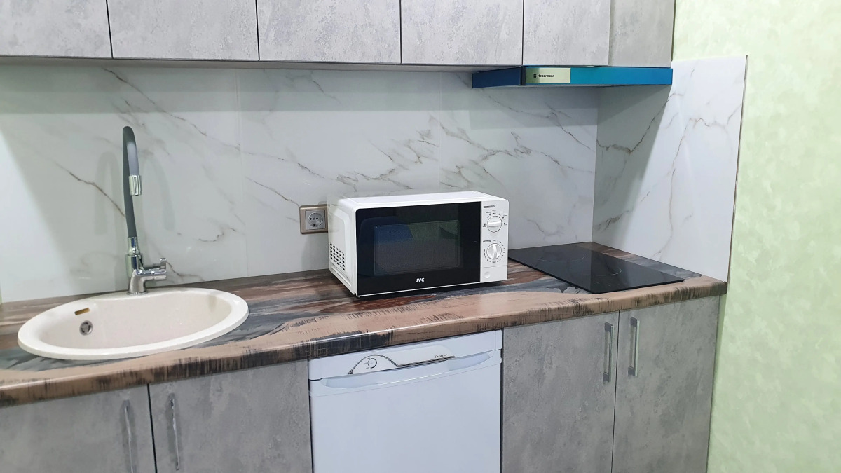 Квартира-студия новая в самом центре города с дизайнерским ремонтом