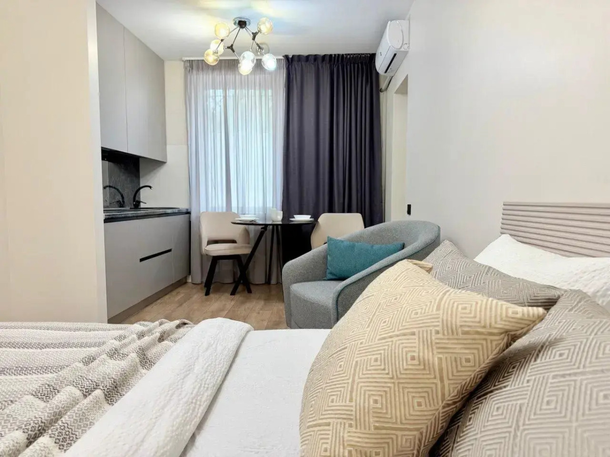 Современная студия в центре Апартаменты