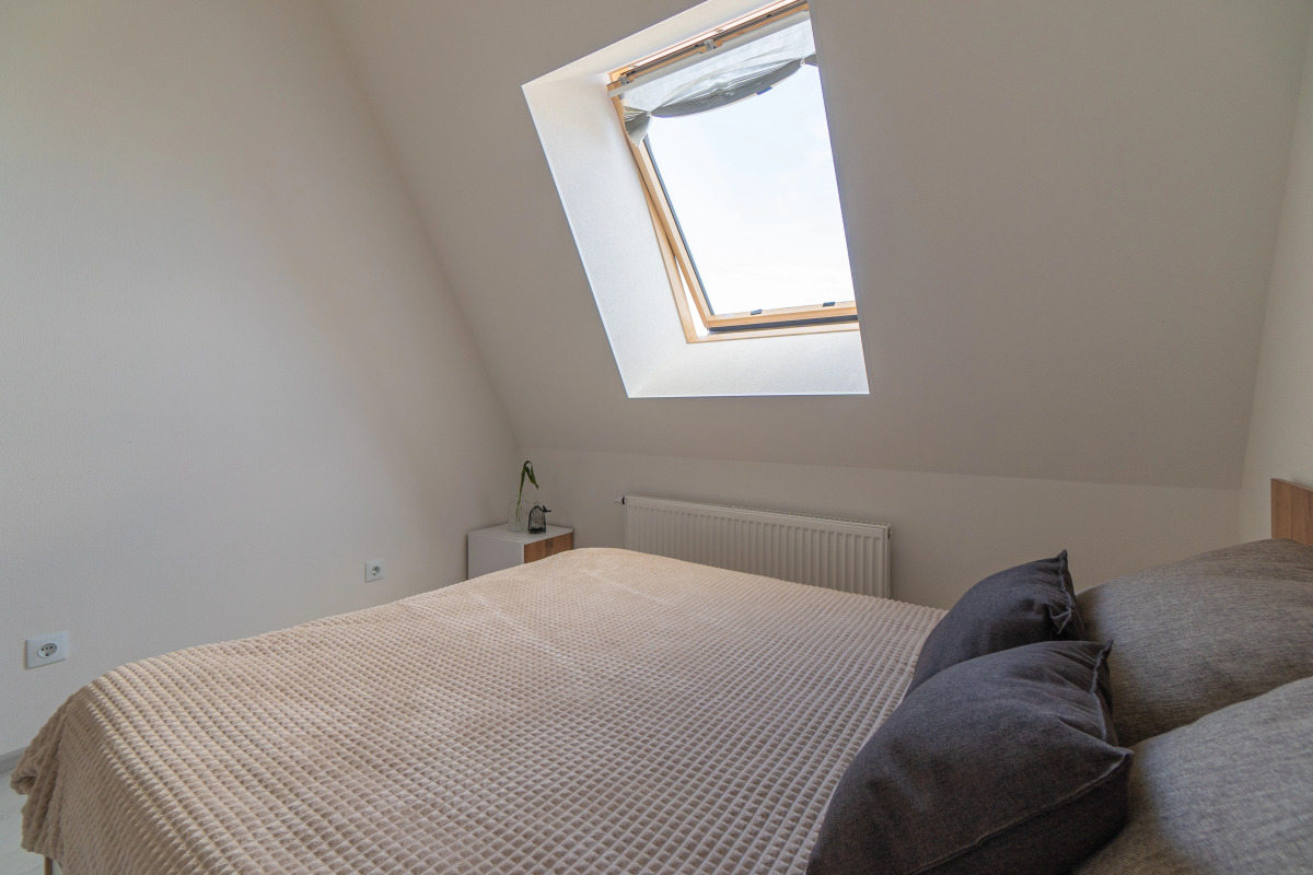 Апартаменты Двухкомнатная Квартира на Мансардном Этаже