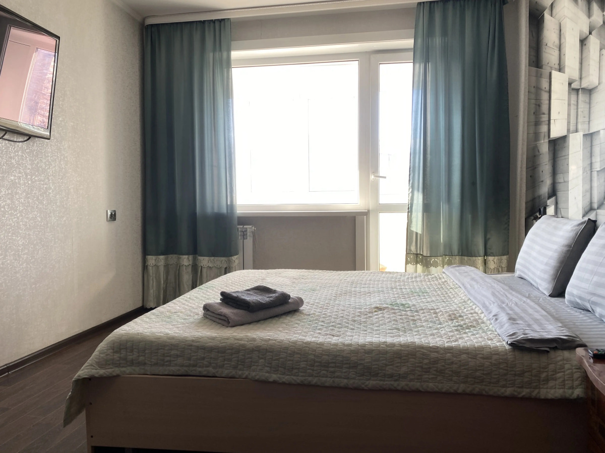 Квартира Двухкомнатные апартаменты в центре